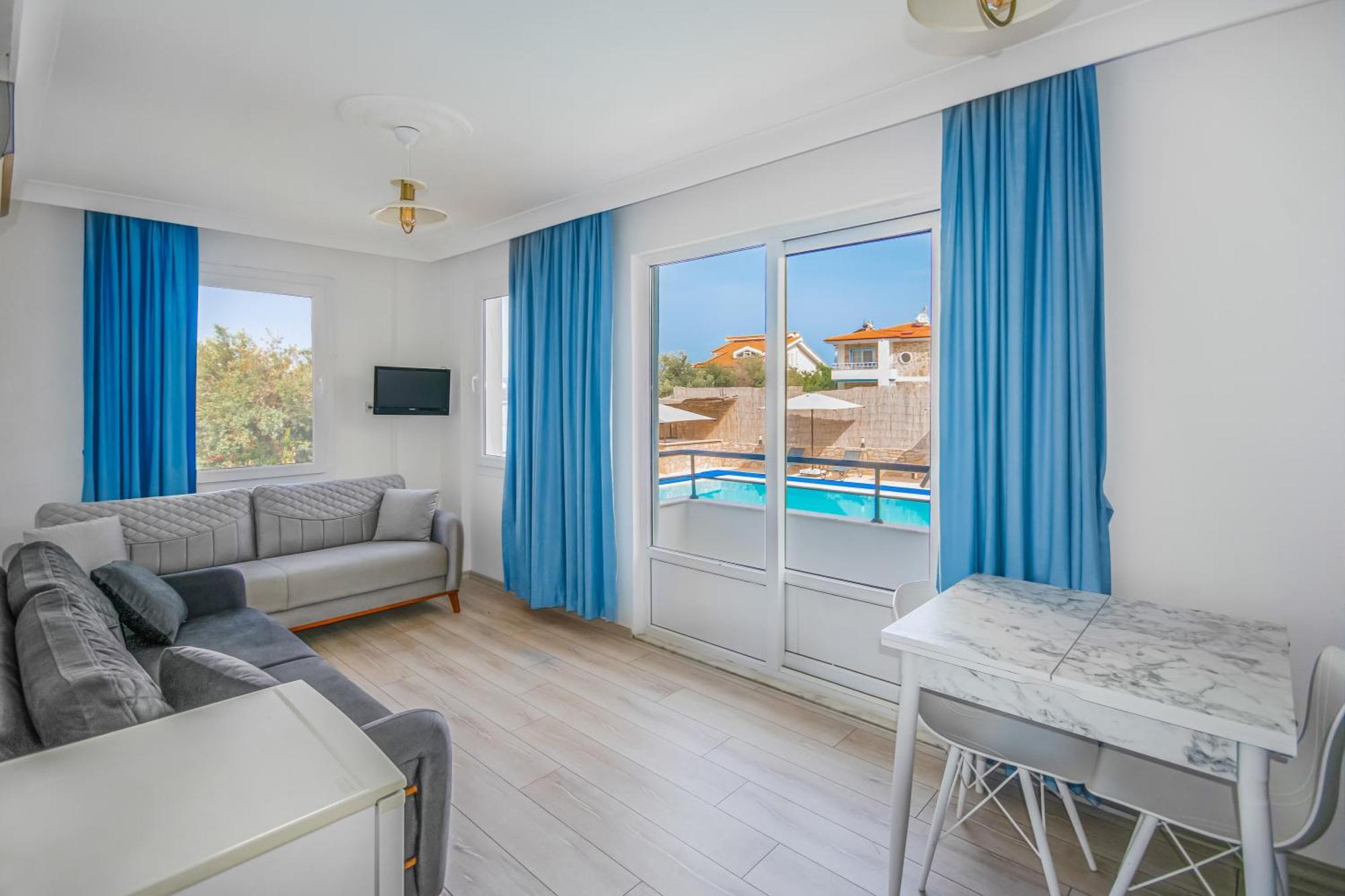 Oezguem Suite Otel Датча Екстериор снимка
