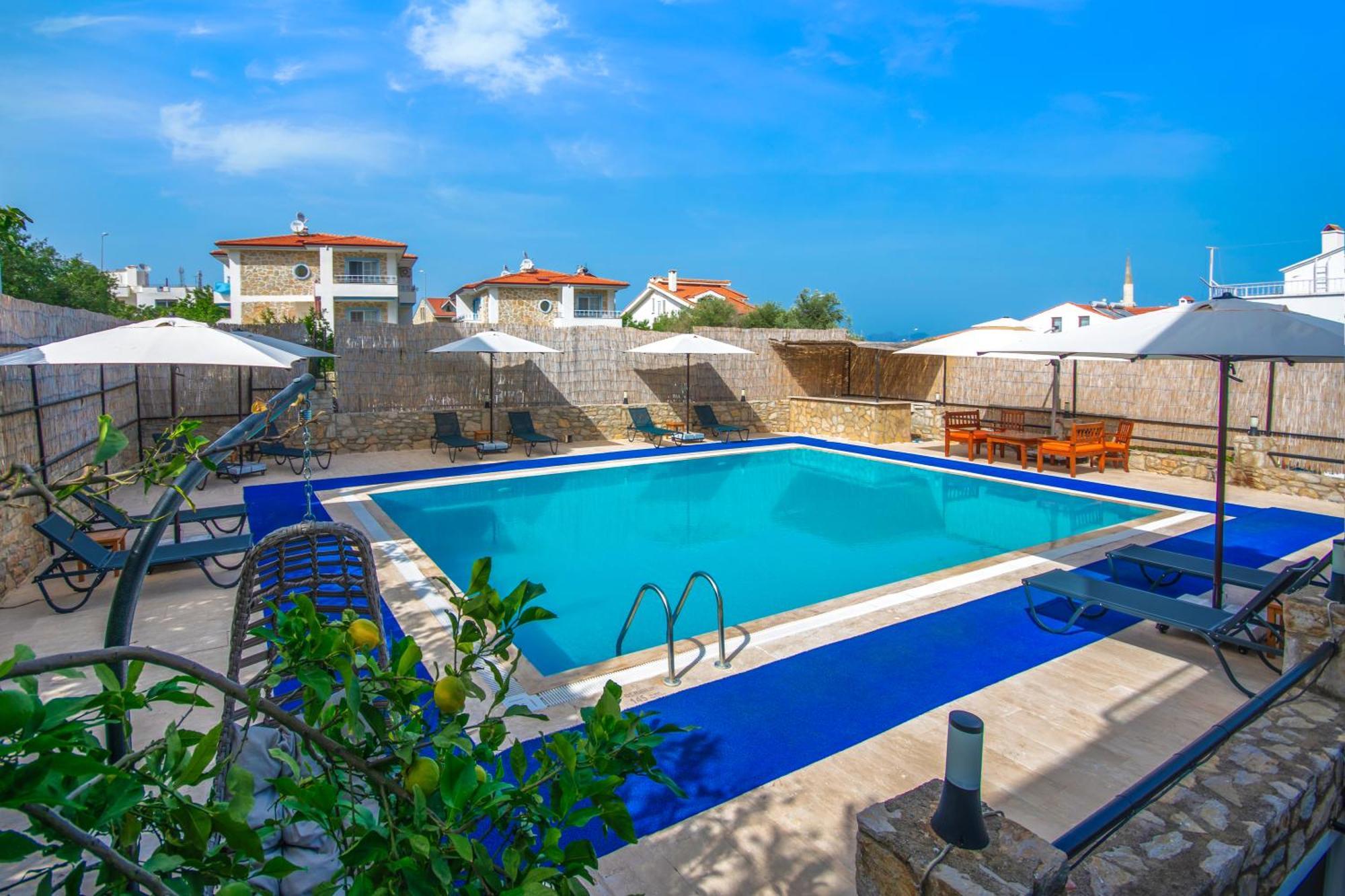 Oezguem Suite Otel Датча Екстериор снимка